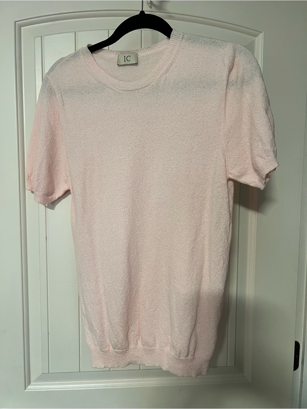 Women’s crewneck sweater top from the contemporary French fashion brand Caroll